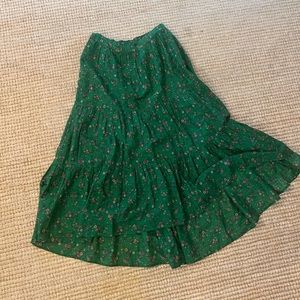 Xirena floral skirt. Shorter in front then back. Size small.